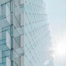 edge of an office building with glass panels