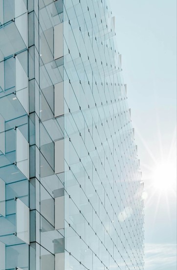 edge of an office building with glass panels 