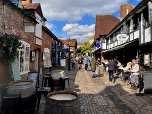 cobbled street with retail units either side 