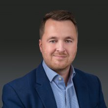 head and shoulders photo of man in jacket and shirt