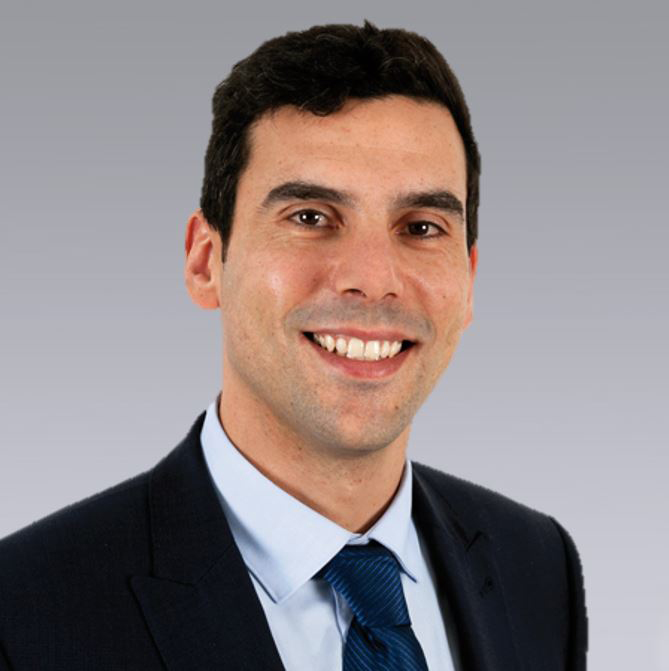 head and shoulders image of man in suit and tie 